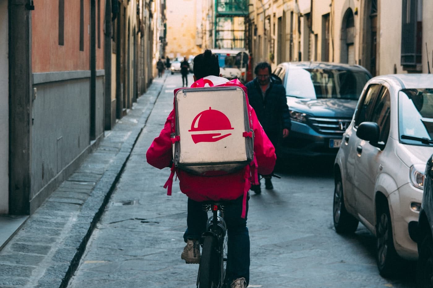 A delivery rider carrying an order